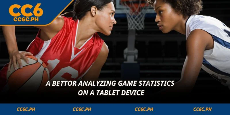 A bettor analyzing game statistics on a tablet device